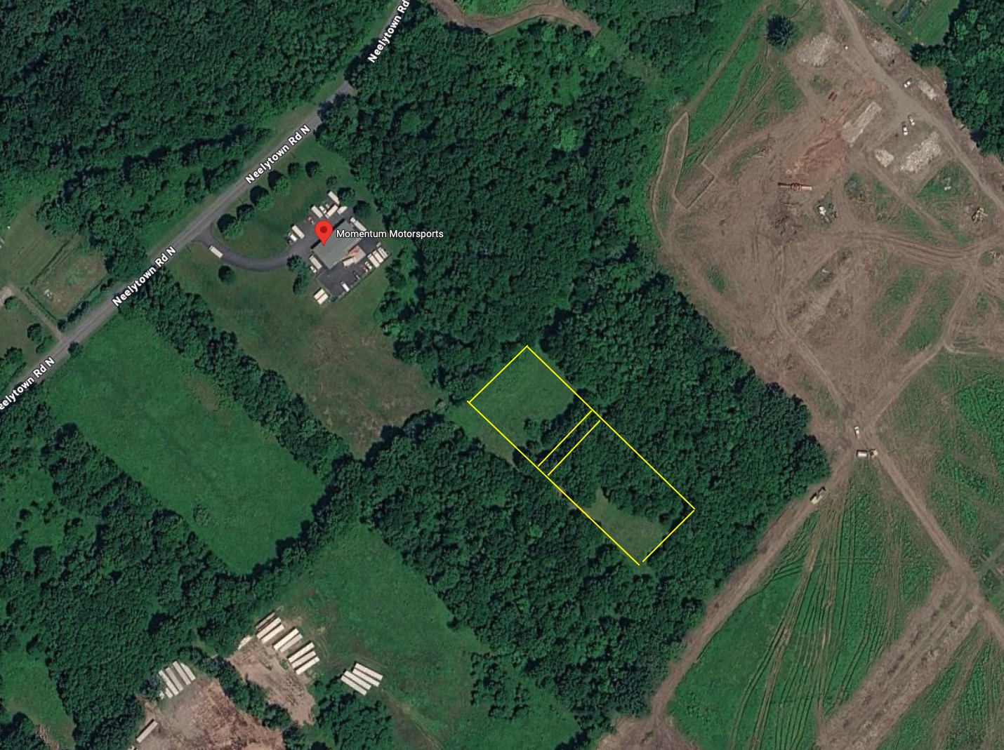 Aerial of the field site off Neelytown Rd N with the planned area outlined